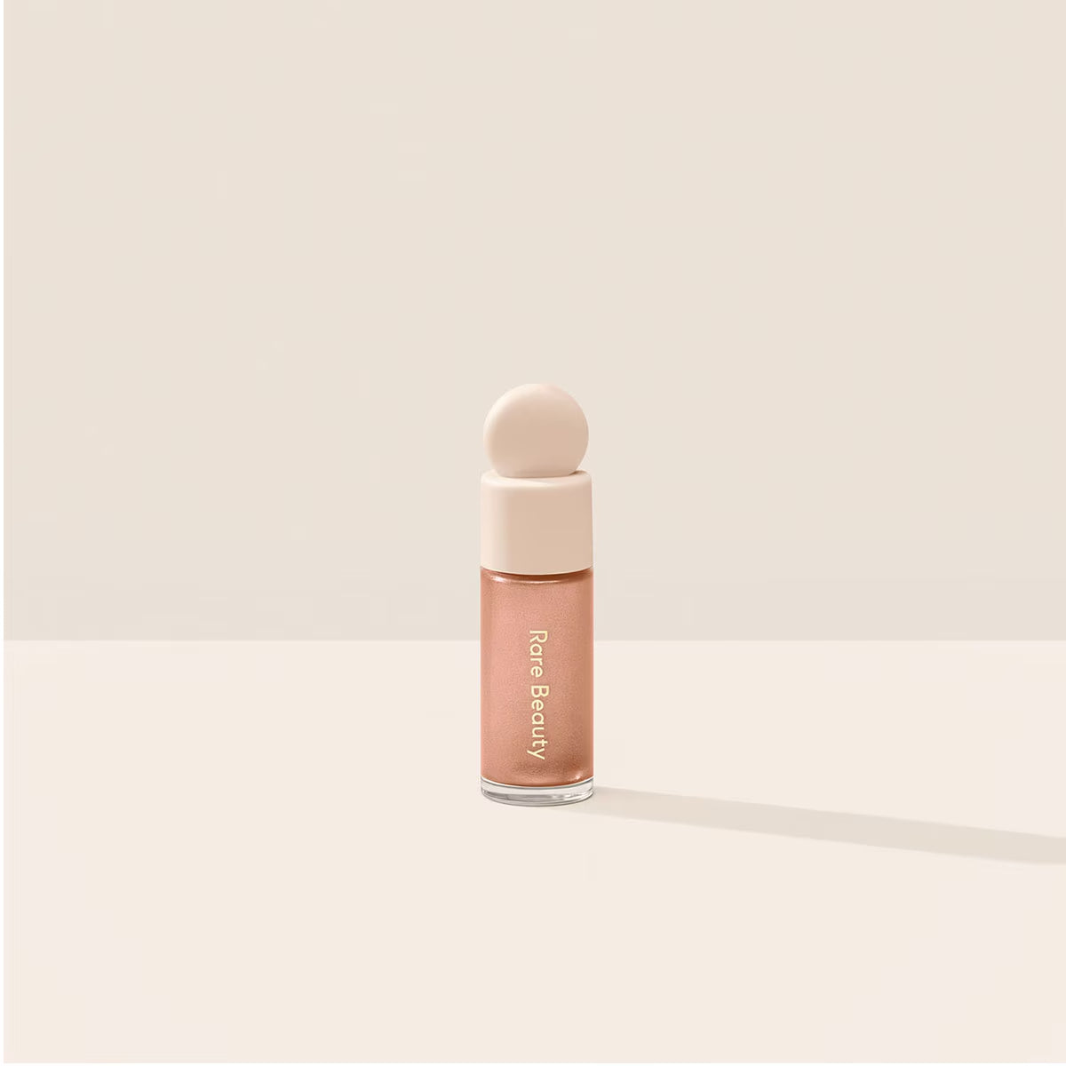 MINI POSITIVE LIGHT LIQUID LUMINIZER MESMERIZE - RARE BEAUTY