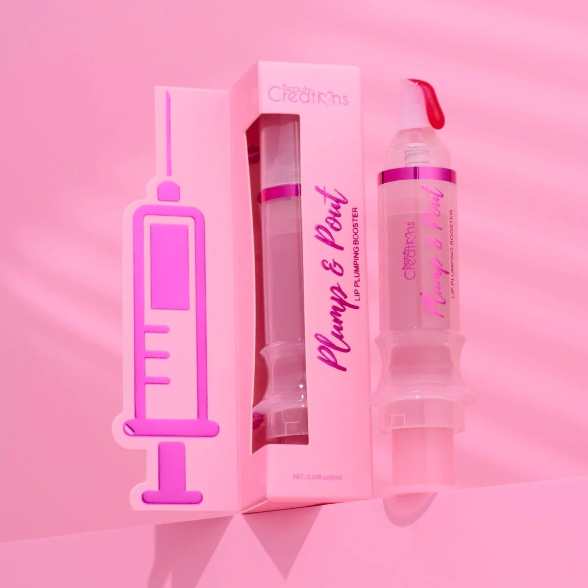 LIP GLOSS VOLUMINIZADOR PLUMP & POUT LEGALLY HOT - BEAUTY CREATIONS