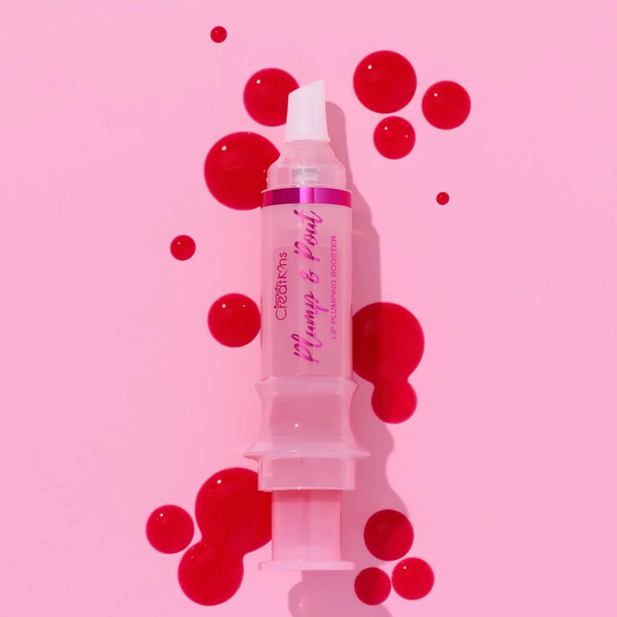 LIP GLOSS VOLUMINIZADOR PLUMP & POUT LEGALLY HOT - BEAUTY CREATIONS